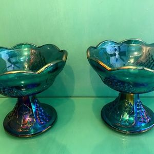 PAIR of blue Carnival Glass footed candle holders.